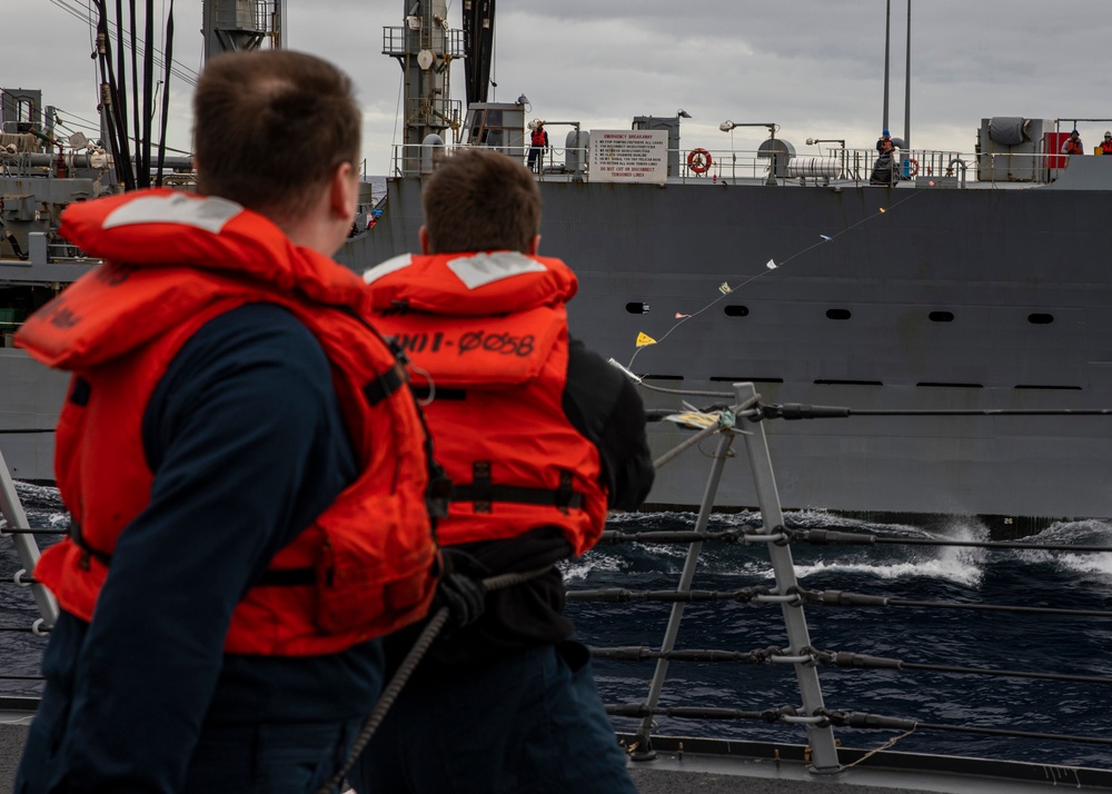 USS Rafael Peralta (DDG 115) conducts a replenishment-at-sea with the Military Sealift Command fleet replenishment oiler USNS Tippecanoe (T-AO 199)