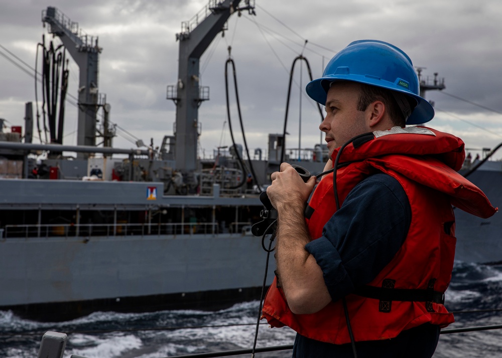 USS Rafael Peralta (DDG 115) conducts a replenishment-at-sea with the Military Sealift Command fleet replenishment oiler USNS Tippecanoe (T-AO 199)