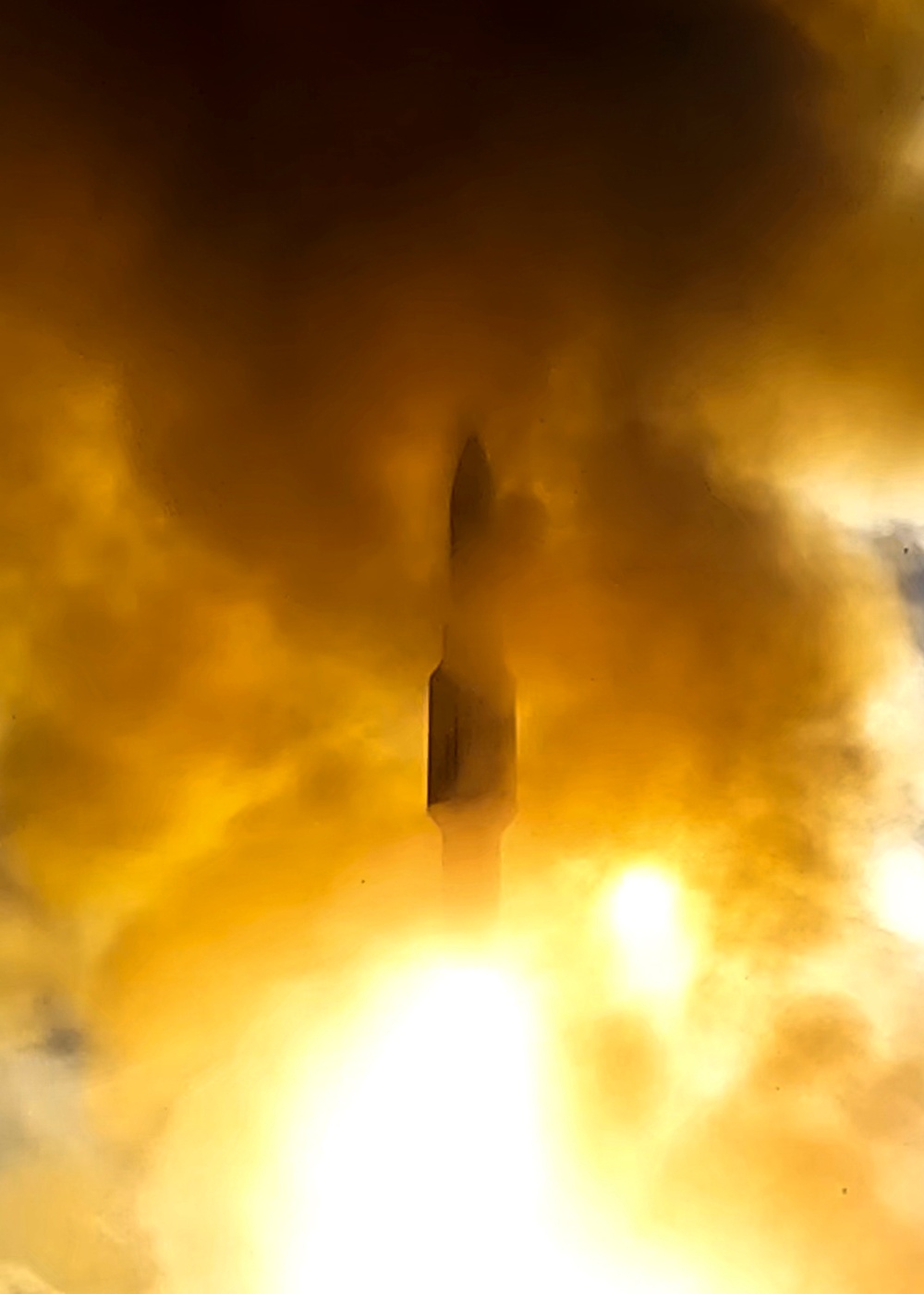 USS Rafael Peralta (DDG 115) fires an SM-2 during a live fire exercise
