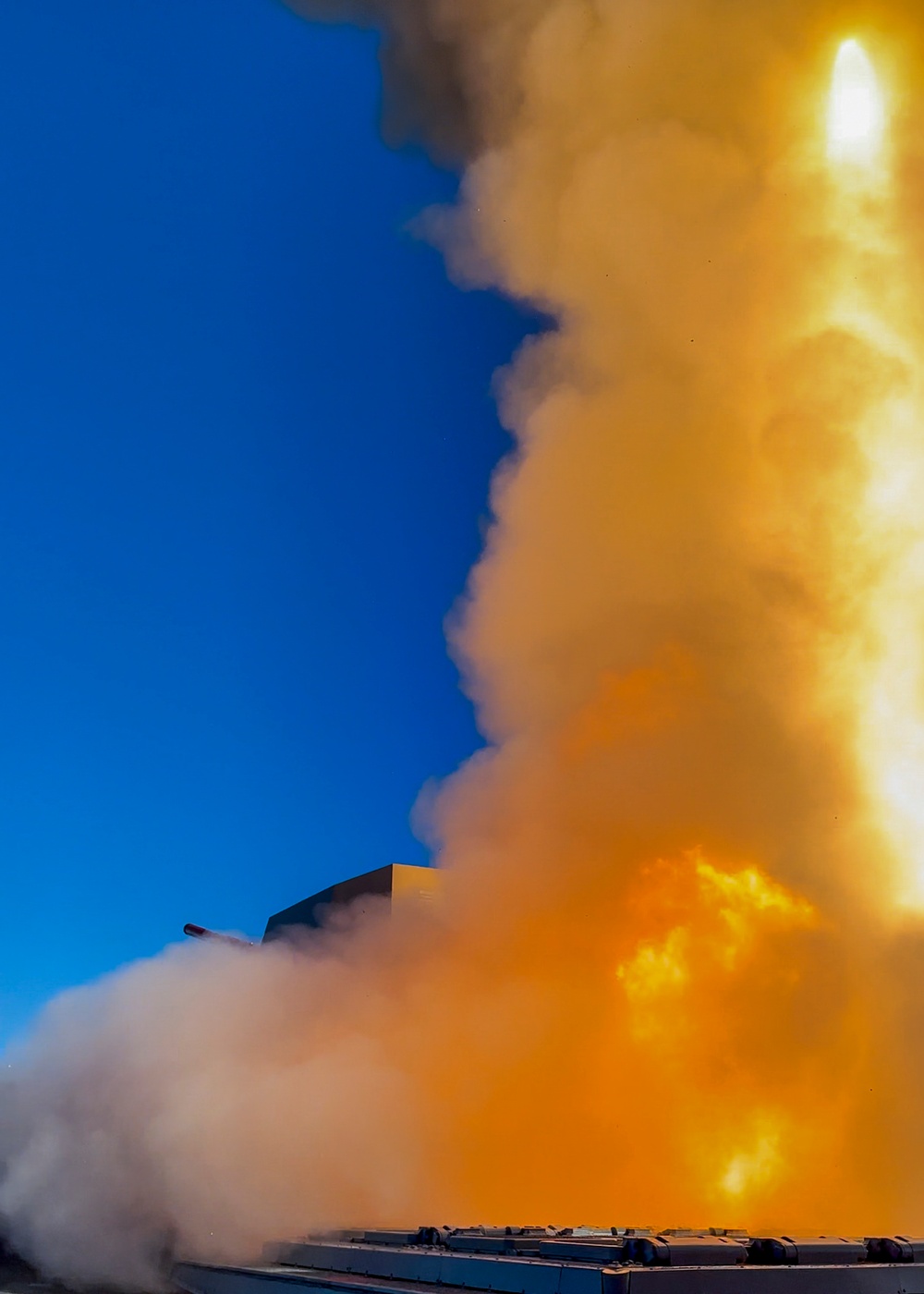 USS Rafael Peralta (DDG 115) fires an SM-2 during a live fire exercise