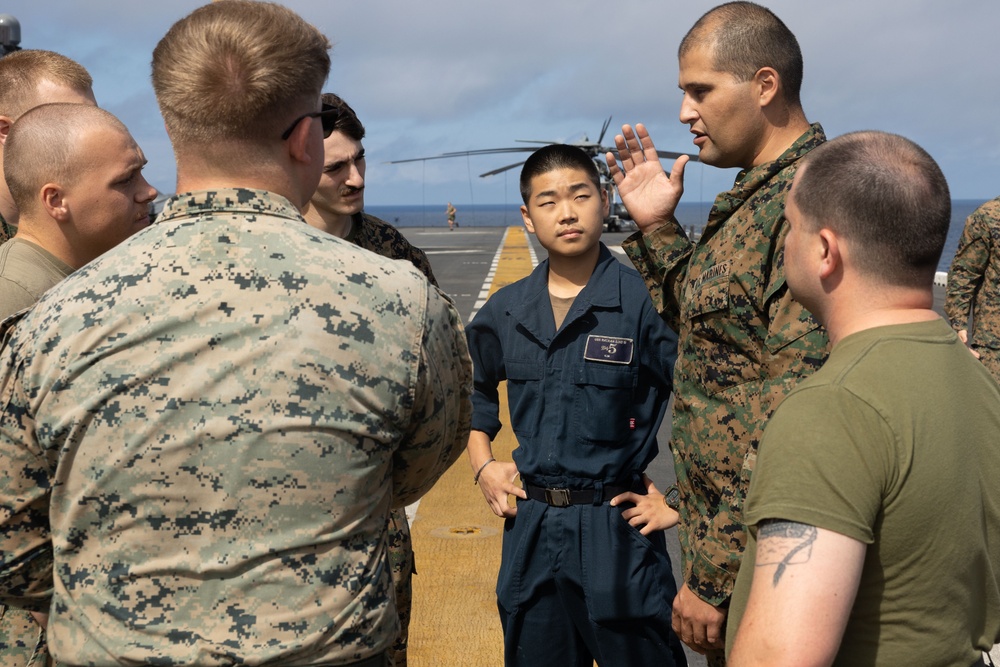 USS Bataan Sailors and Marines conduct corporals sourse