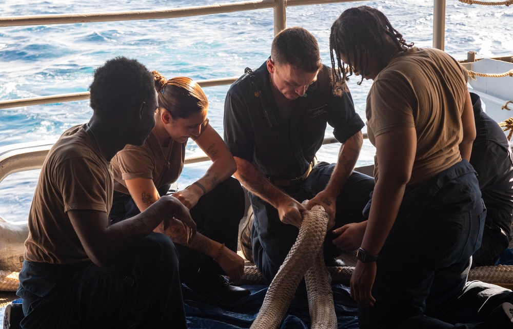 USS Ronald Reagan (CVN 76) Sailors splice line