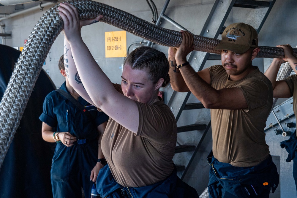 USS Ronald Reagan (CVN 76) Sailors splice line