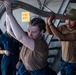 USS Ronald Reagan (CVN 76) Sailors splice line