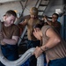 USS Ronald Reagan (CVN 76) Sailors splice line