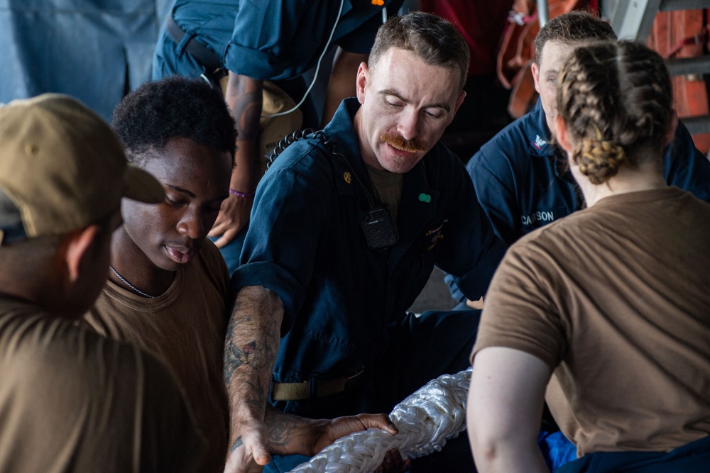 USS Ronald Reagan (CVN 76) Sailors splice line