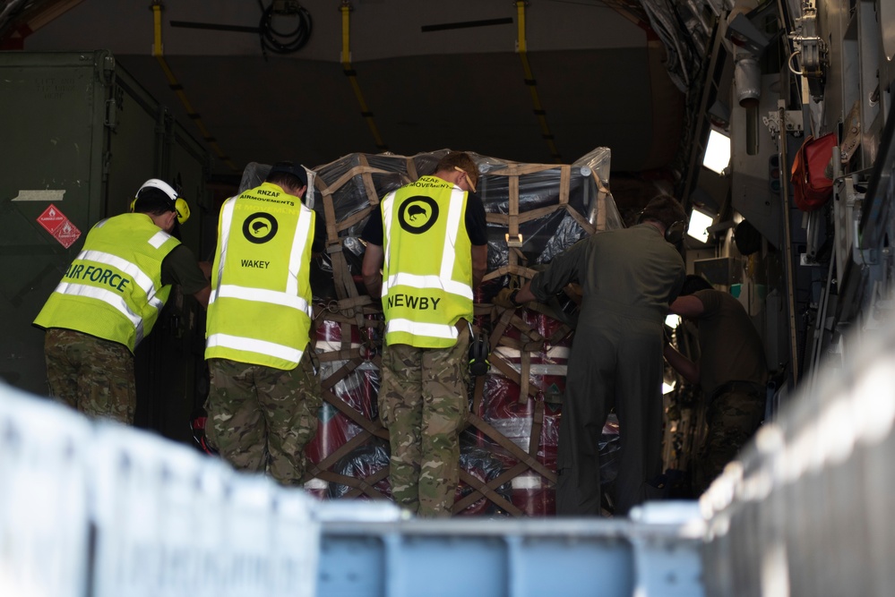 Combined members load, transport Airmen for Talisman Sabre 23