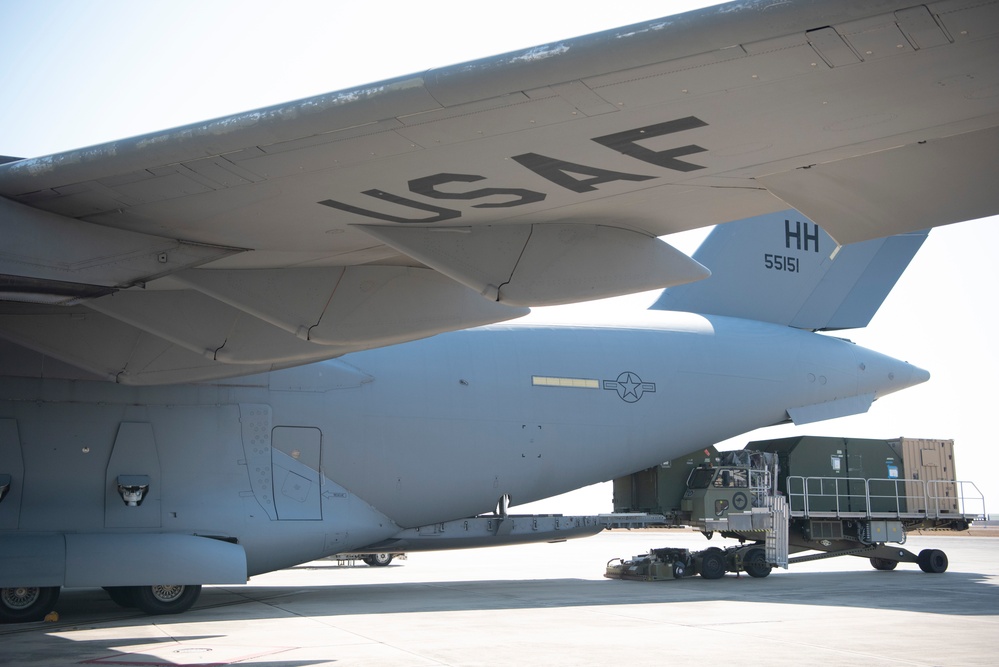 Combined members load, transport Airmen for Talisman Sabre 23