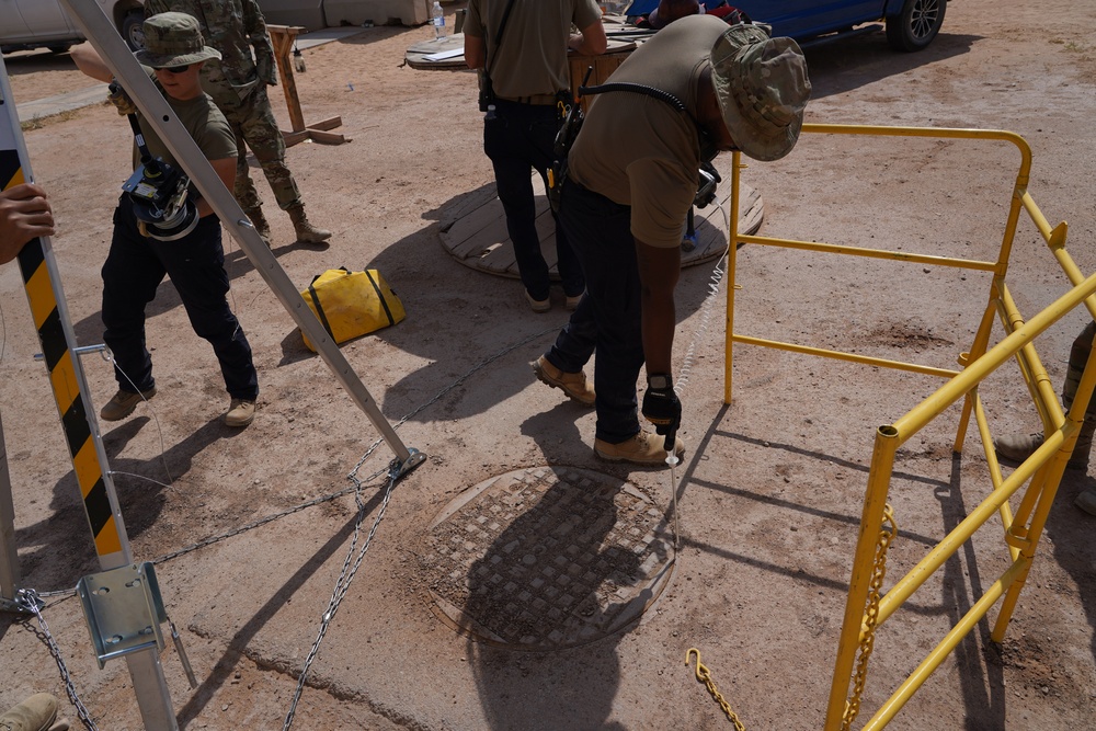 Confined space program team performs Preventive Manhole Inspections