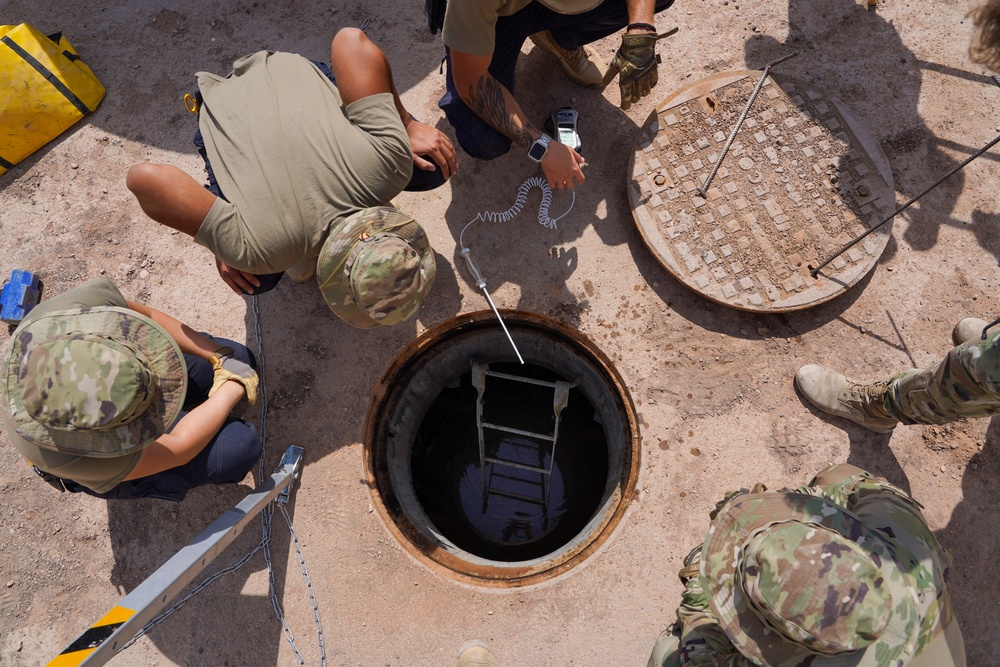 Confined space program team performs Preventive Manhole Inspections