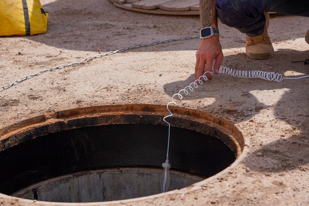 Confined space program team performs Preventive Manhole Inspections