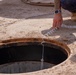 Confined space program team performs Preventive Manhole Inspections