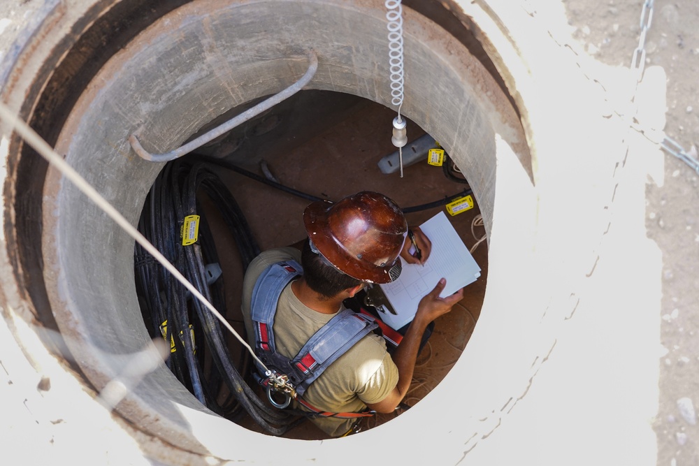 Confined space program team performs Preventive Manhole Inspections