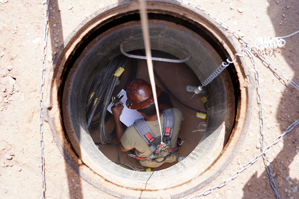 Confined space program team performs Preventive Manhole Inspections