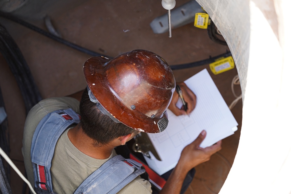 Confined space program team performs Preventive Manhole Inspections