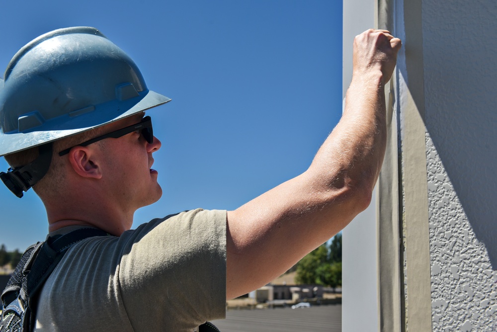 92nd CES Structures performs building maintenance