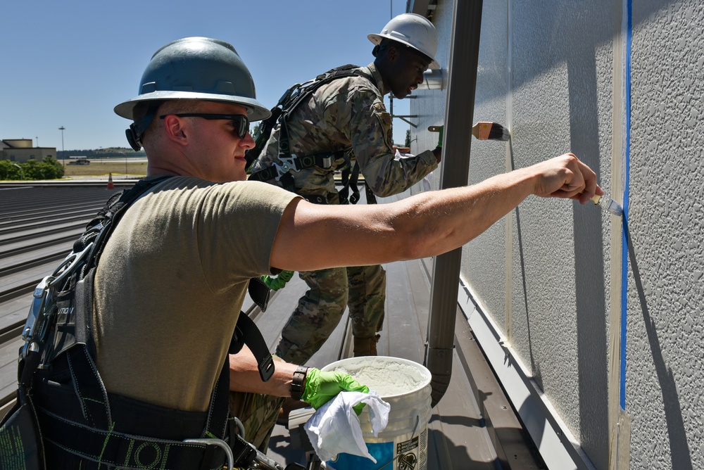 92nd CES Structures performs building maintenance