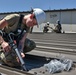 92nd CES Structures performs building maintenance