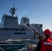 USS Ralph Johnson conducts a replenishment-at-sea with the Japan Maritime Self-Defense Force ship JS Mashu.