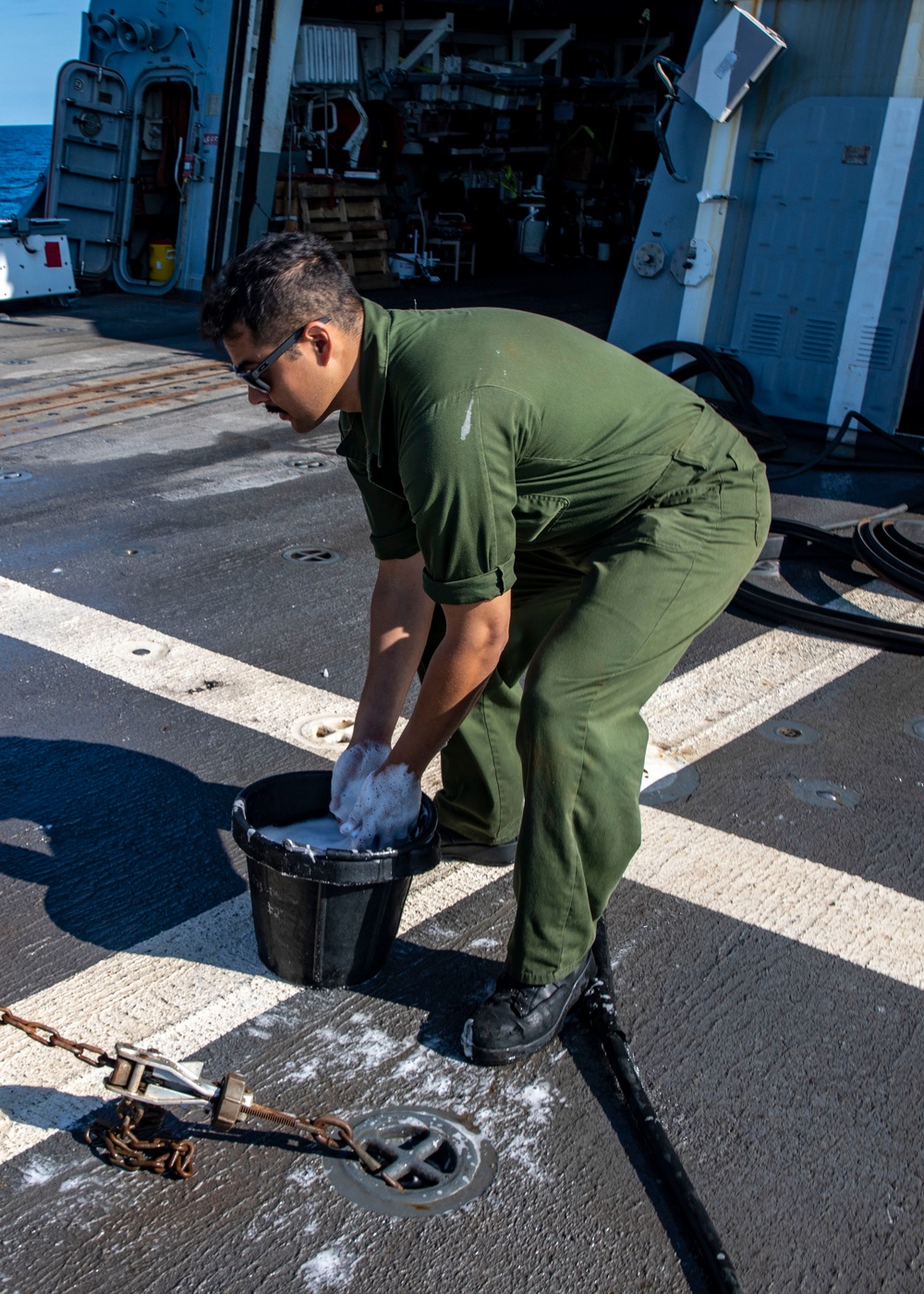 Sailors Conduct Helo Wash-Down aboard USS John Finn (DDG 113)