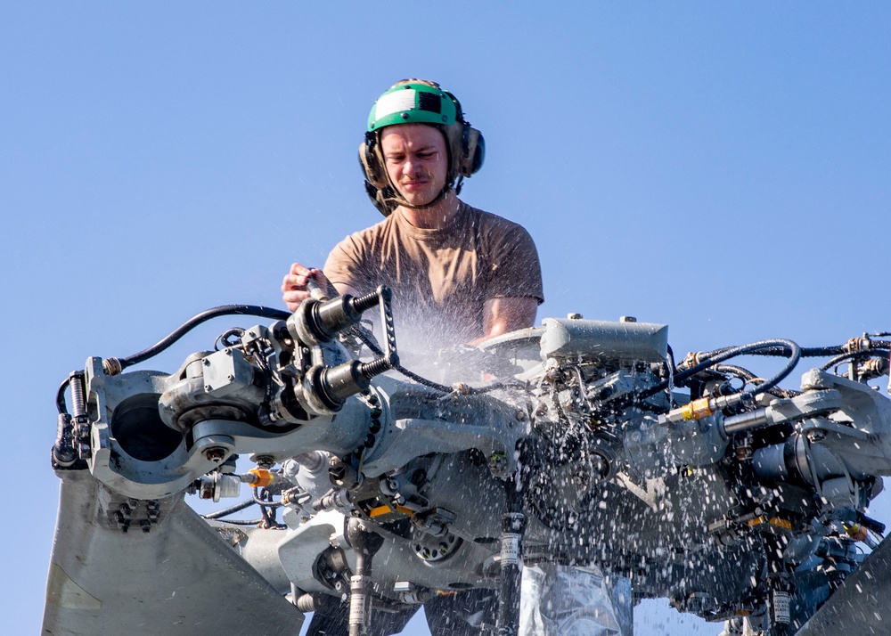 Sailors Conduct Helo Wash-Down aboard USS John Finn (DDG 113)