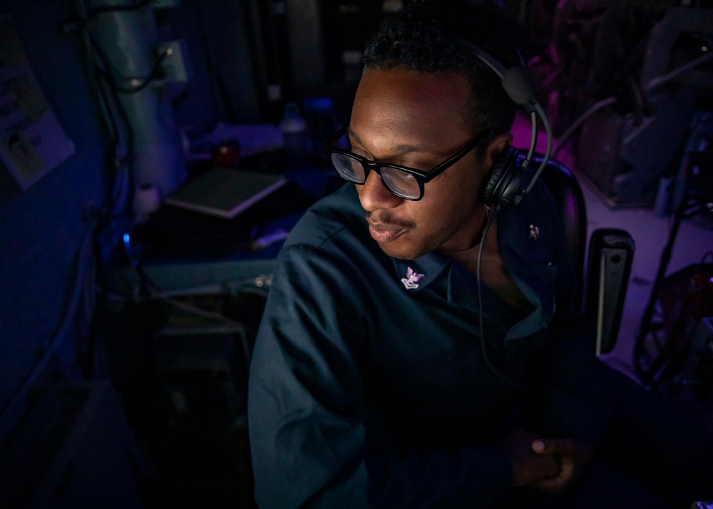 Sailors Stand Watch in the Combat Information Center aboard USS John Finn (DDG 113)