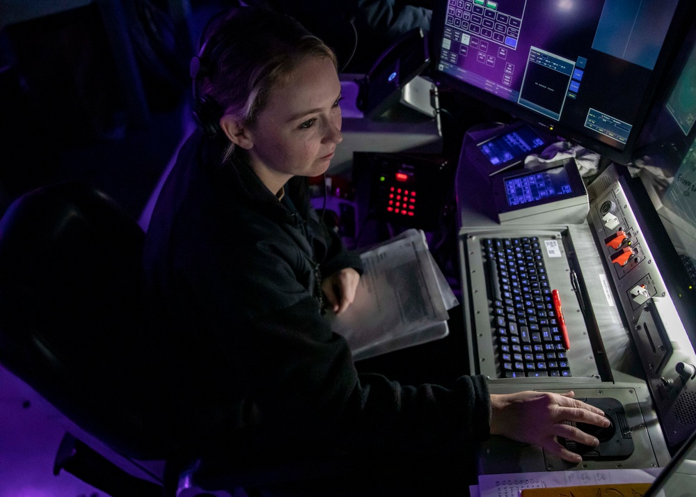 Sailors Stand Watch in the Combat Information Center aboard USS John Finn (DDG 113)