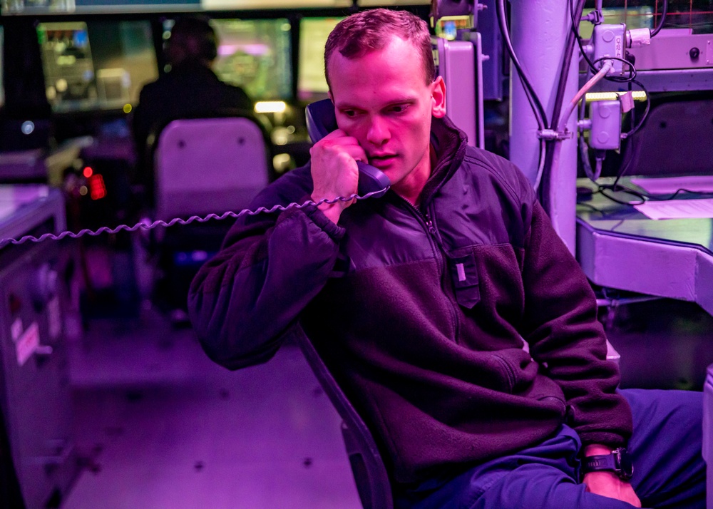 Sailors Stand Watch in the Combat Information Center aboard USS John Finn (DDG 113)