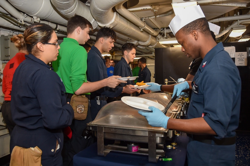 USS Ronald Reagan (CVN 76) Sailors serve Brunch
