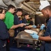 USS Ronald Reagan (CVN 76) Sailors serve Brunch