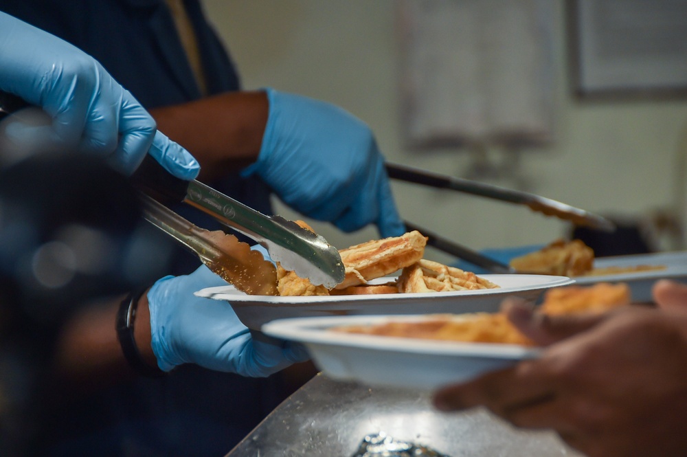 USS Ronald Reagan (CVN 76) Sailors serve Brunch