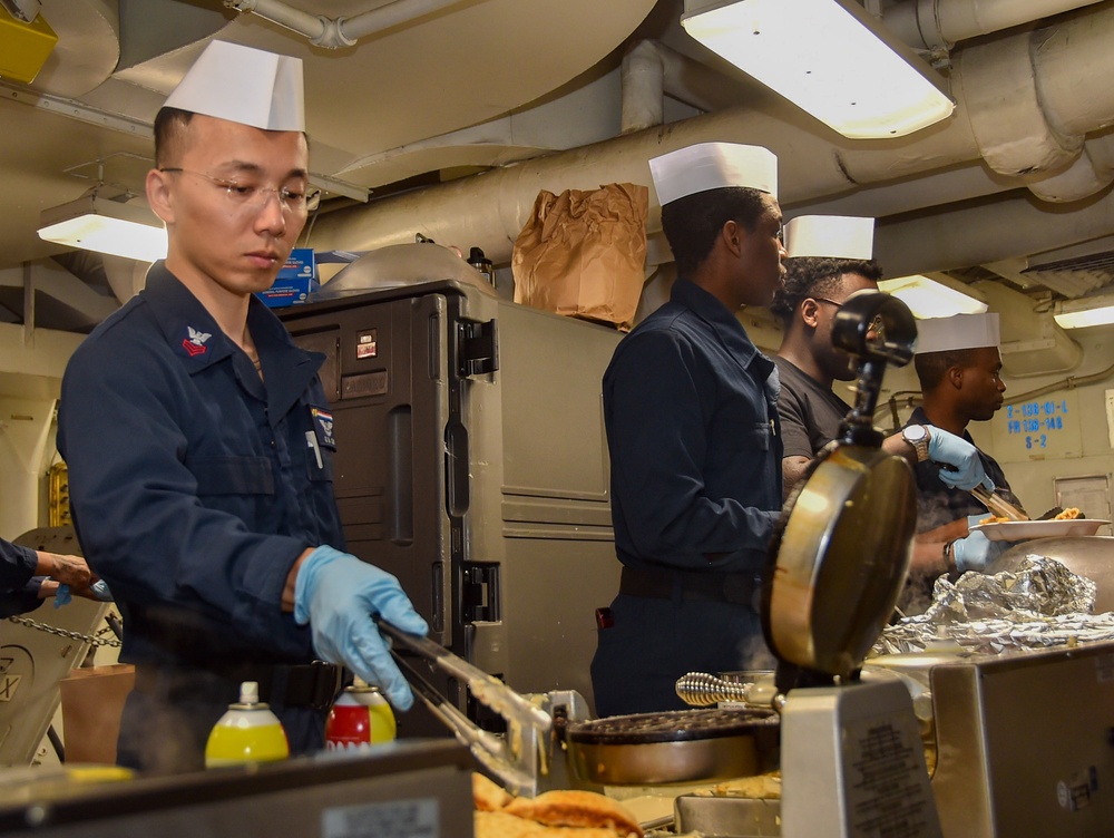 USS Ronald Reagan (CVN 76) Sailors serve Brunch