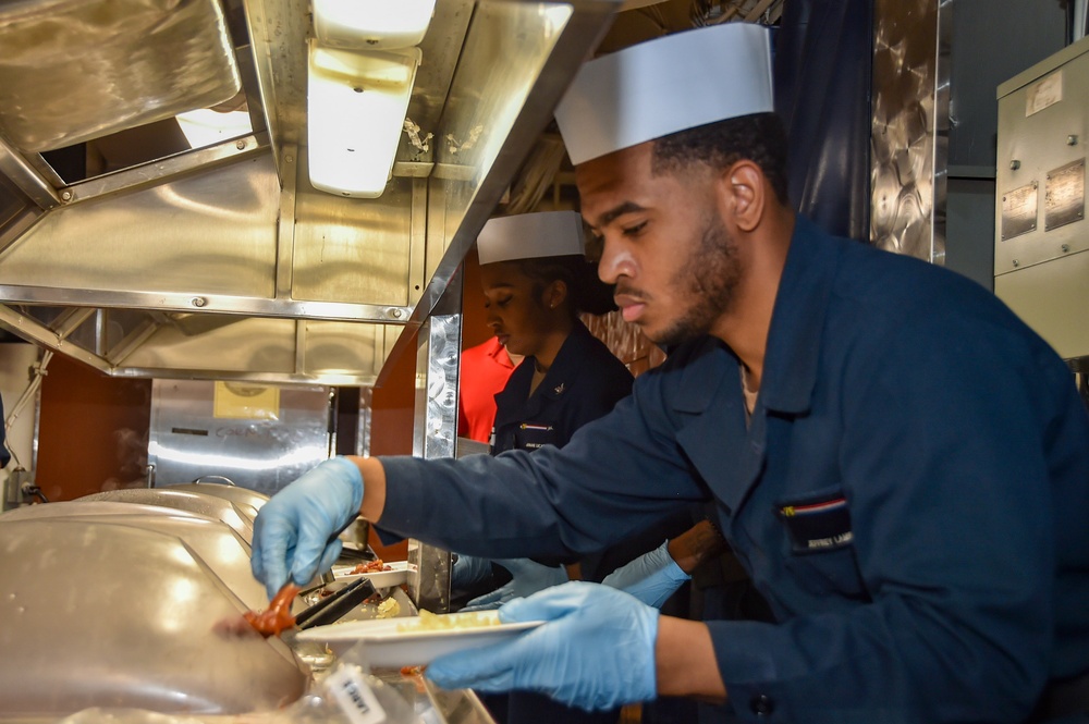 USS Ronald Reagan (CVN 76) Sailors serve Brunch