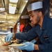 USS Ronald Reagan (CVN 76) Sailors serve Brunch