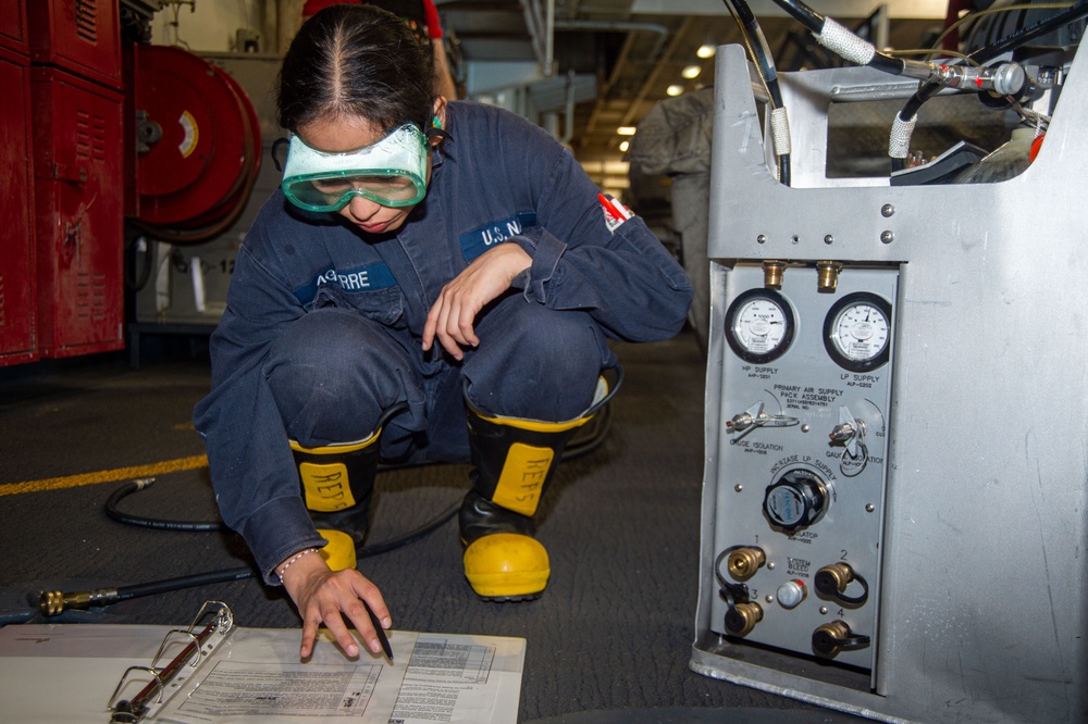 USS Ronald Reagan (CVN 76) Sailors conducts flying squad drills