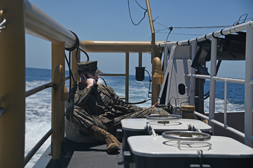 Coast Guard and Marine Corps members test communications during joint interagency communication exercise in San Diego