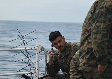 Coast Guard and Marine Corps members test communications during joint interagency communication exercise in San Diego