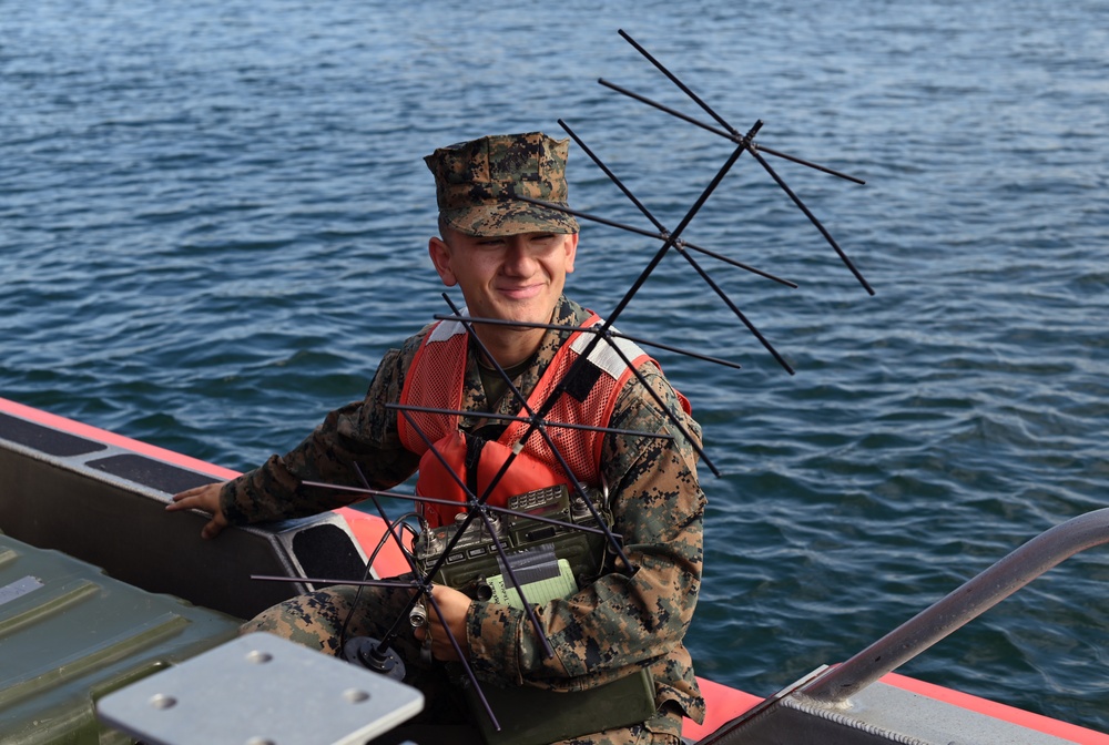 Coast Guard and Marine Corps members test communications during joint interagency communication exercise in San Diego