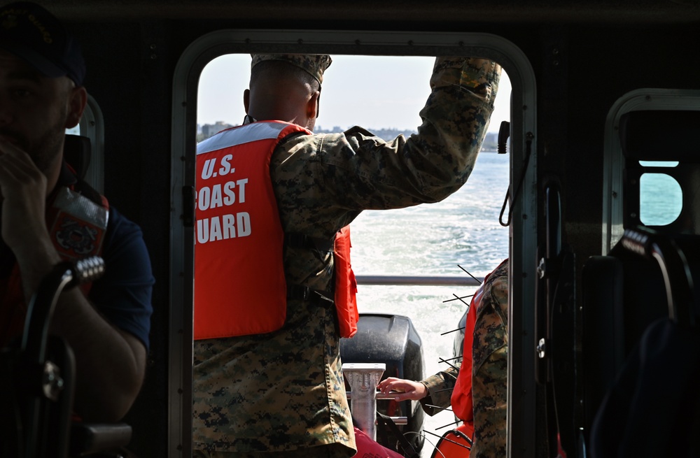 Coast Guard and Marine Corps members test communications during joint interagency communication exercise in San Diego