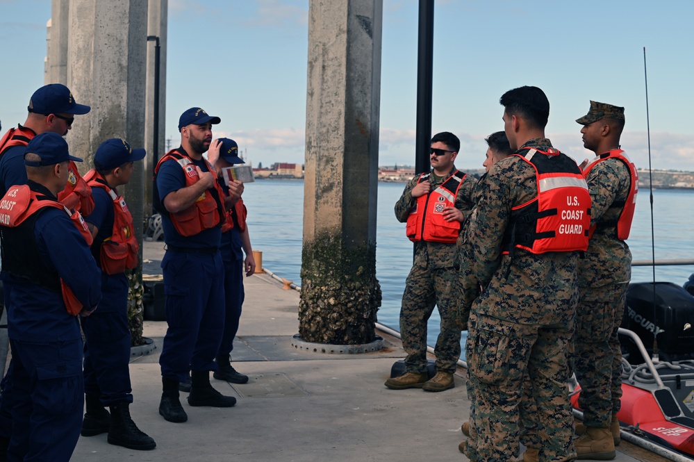 Coast Guard and Marine Corps members test communications during joint interagency communication exercise in San Diego