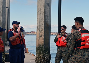 Coast Guard and Marine Corps members test communications during joint interagency communication exercise in San Diego