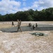 U.S. Marines set up a canopy for live fire drill