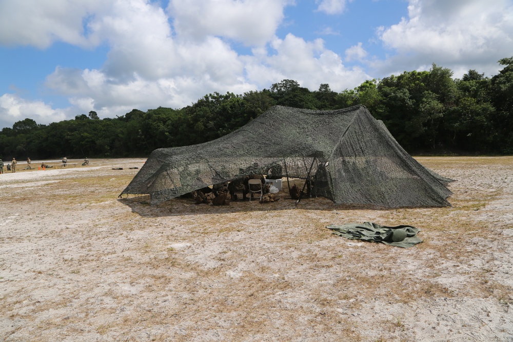 U.S. Marines setup a canopy for a live-fire range