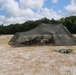 U.S. Marines setup a canopy for a live-fire range