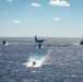 USS Ronald Reagan (CVN 76) sails in formation with HMAS Perth during Talisman Sabre 23