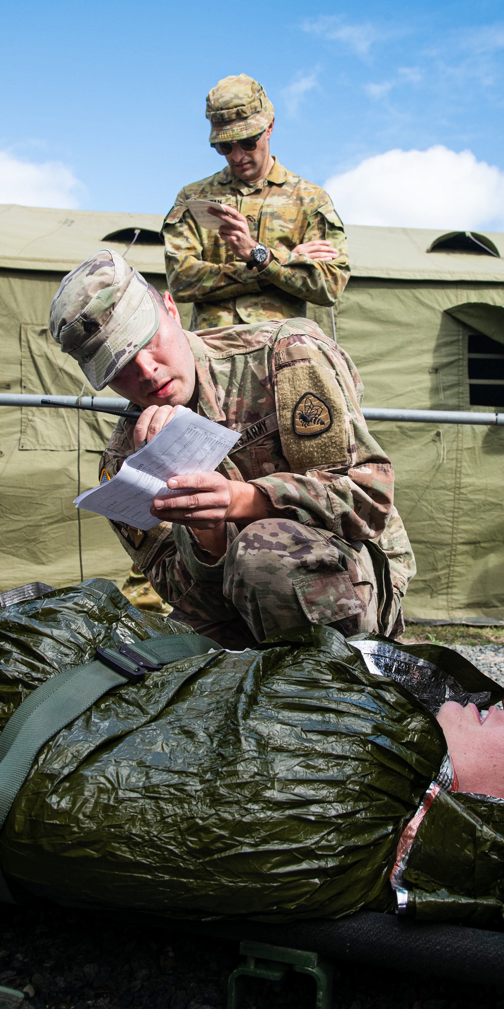 Soldiers of the 144th Area Support Company train with the 3rd Health Battalion Australian Defense Force during Talisman Sabre
