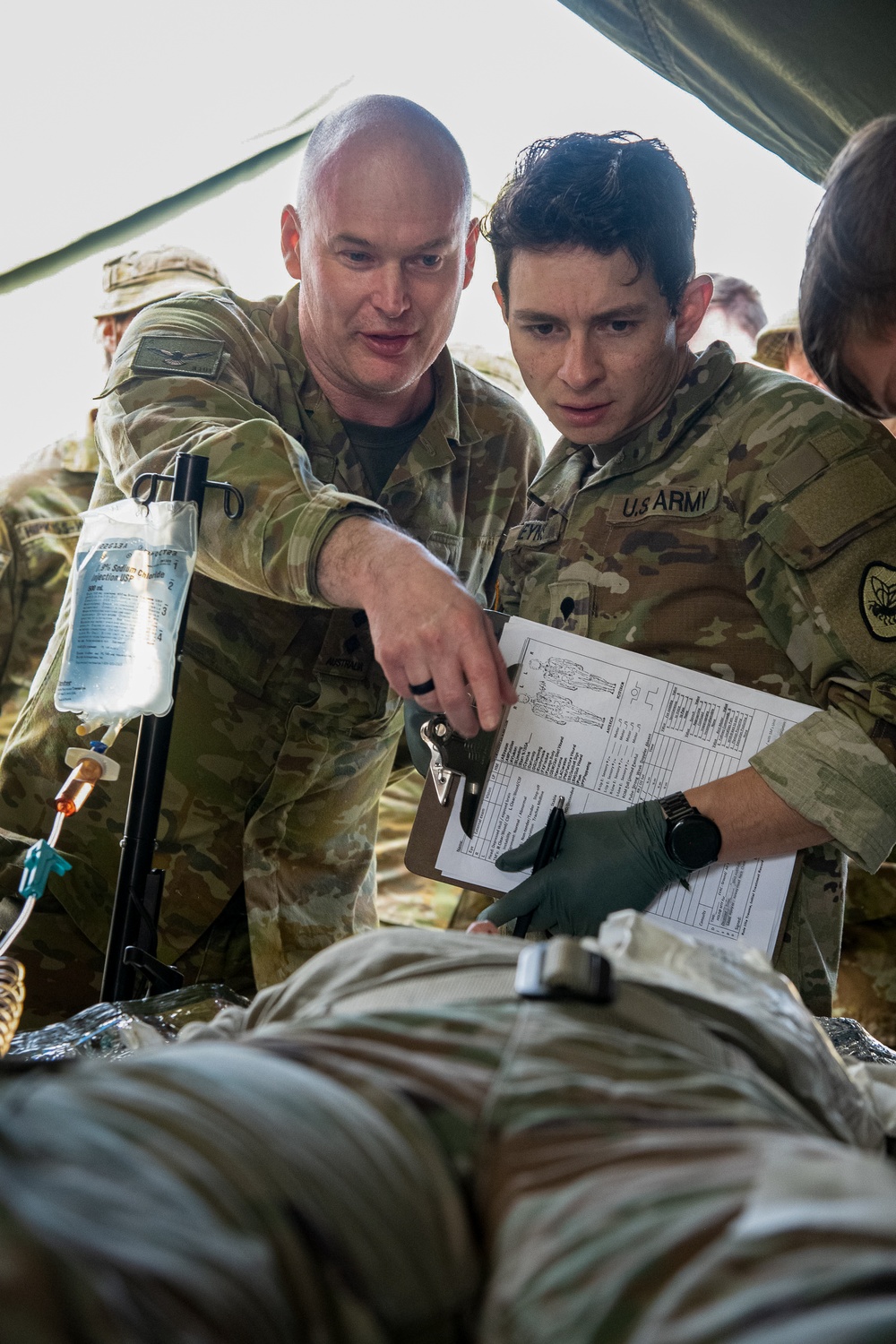 Soldiers of the 144th Area Support Company train with the 3rd Health Battalion Australian Defense Force during Talisman Sabre