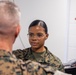 Assistant Commandant of the Marine Corps Gen. Eric M. Smith reenlists Cpl. Haley Dominguez