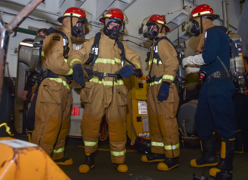 USS Ronald Reagan (CVN 76) Sailors conducts flying squad drill