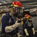 USS Ronald Reagan (CVN 76) Sailors conducts flying squad drill